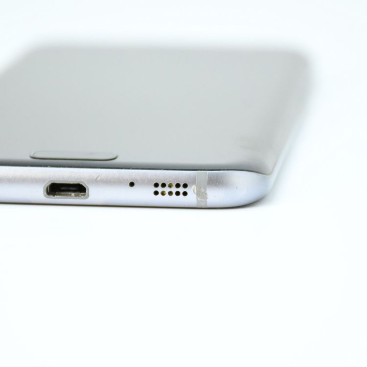 �ڱվ����ʡ�au SIM�ե꡼ Galaxy S7 edge SCV33 �֥�å����˥���