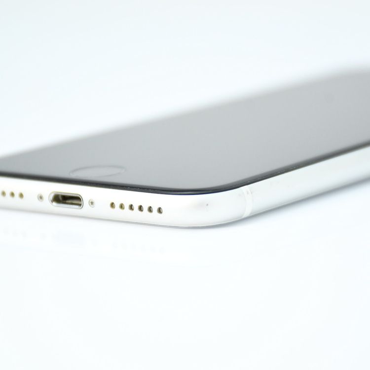 �����ʡ������Хåƥ꡼76���au SIM�ե꡼ iPhone SE �裲���� 64GB �ۥ磻��