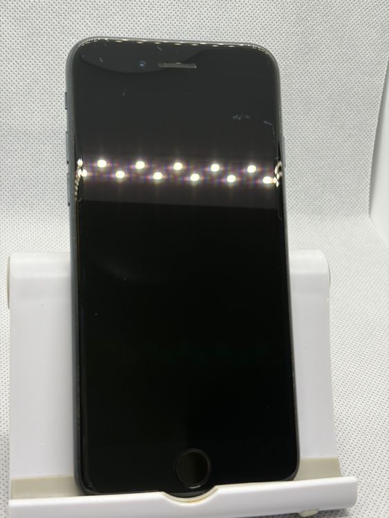 ���Хåƥ꡼83% SIM�ե꡼ iPhoneSE ��3���� 128GB �ߥåɥʥ���