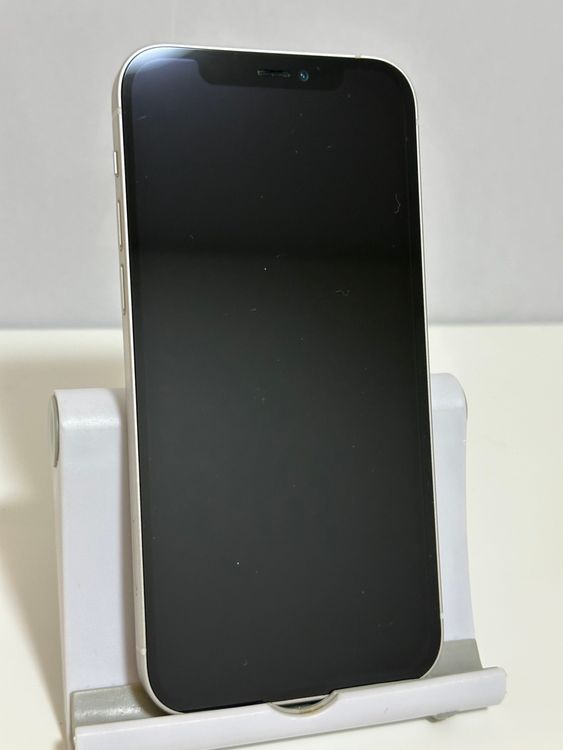 ���Хåƥ꡼81% SIM�ե꡼ iPhone12 64GB �ۥ磻��