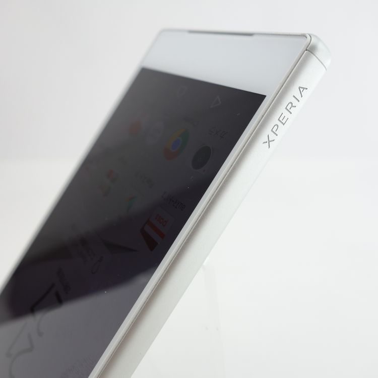 ��SIM�ե꡼��Xperia Z5 SOV32 �ۥ磻�� �������¡� aui��SIM���å������
