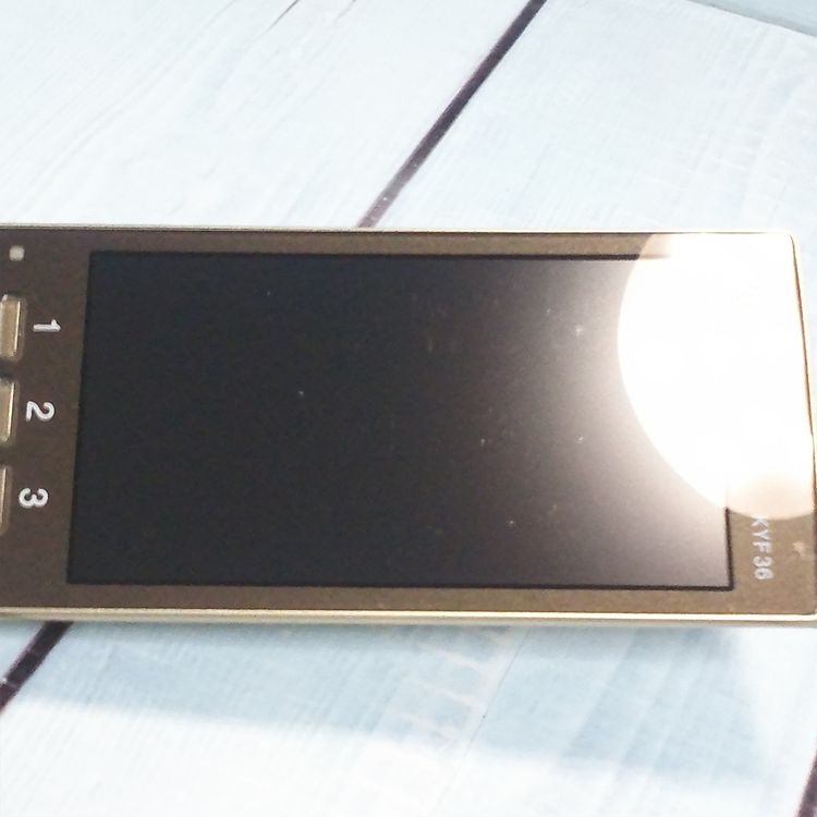 KYOCERA au KYF36 ���󤿤󥱡����� GOLD  990