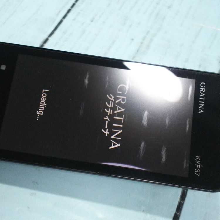 au KYOCERA GRATINA KYF37 �ͥ��ӡ��֥�å�  010