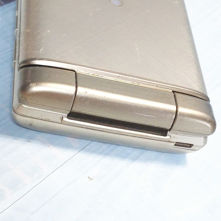 KYOCERA au KYF36 ���󤿤󥱡����� GOLD  701