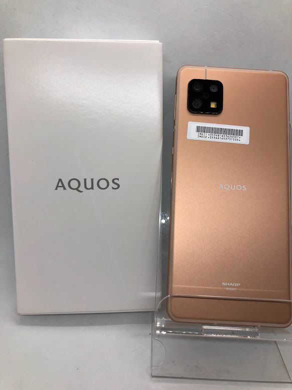 ムスビー｜AQUOS sense6s SHG07 64GB ライトカッパー SIMフリー【AQUOS 