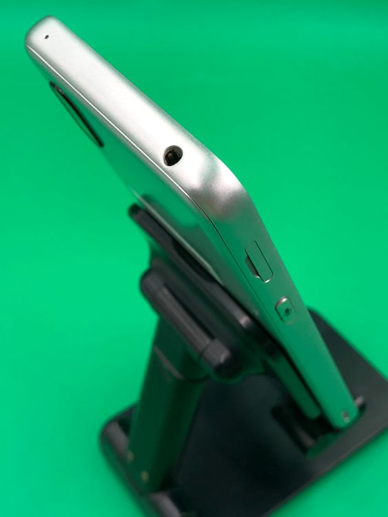 �����礤���� BASIO active 64GB �ۥ磻�� SIM�ե꡼ KDDI ��