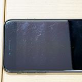 �ڥХåƥ꡼74���iPhone SE (��2����) 64GB Black au