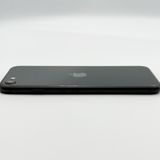 �ڥХåƥ꡼74���iPhone SE (��2����) 64GB Black au